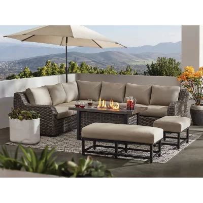 This <b>sectional</b> is crafted of heavy-duty corrosion-resistant powder-coated steel frames wrapped in handwoven all-weather resin wicker in a neutral. . Athena 7piece sectional with firepit  cast ash